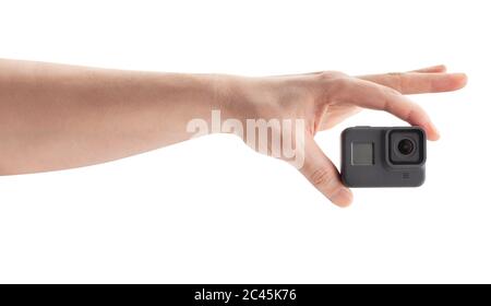 action camera in hand path isolated on white Stock Photo
