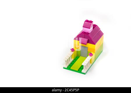 May 15, 2019 - Rome, Italy - Lego house made of classic colored building blocks, isolated on white. Concept of home, construction, investment, savings Stock Photo