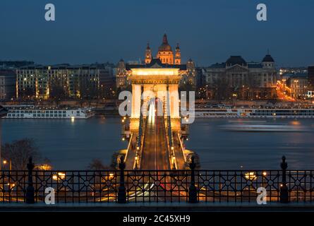 Chain Bridge by night against Budapest waterfront