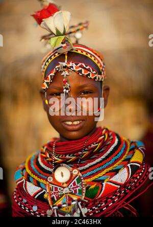 Rendille tribeswoman wearing traditional headdress and jewellery, Marsabit district, Ngurunit, Kenya Stock Photo