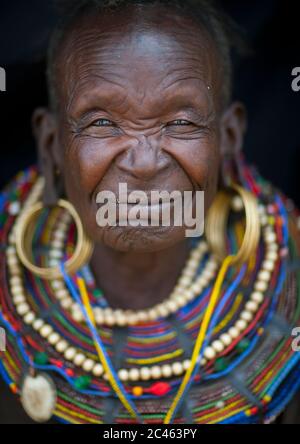 A pokot woman wears large necklaces made from the stems of sedge grass, Baringo county, Baringo, Kenya Stock Photo