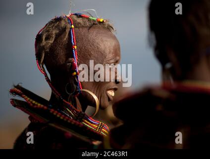 A pokot woman wears large necklaces made from the stems of sedge grass, Baringo county, Baringo, Kenya Stock Photo