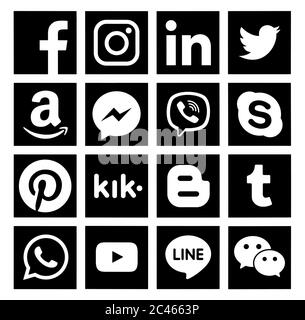 Kiev, Ukraine - March 11, 2019: Collection of popular social media black icons, printed on paper: Facebook, Twitter, Instagram, Pinterest, LinkedIn, T Stock Photo