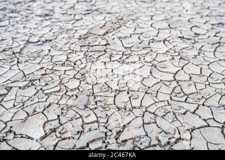 Dry floor surface, soil ground sand cracked texture pattern Stock Photo
