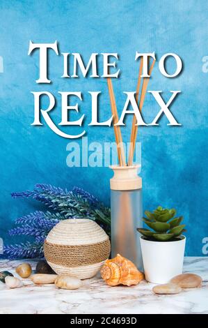 Spa objects and elements on a marble table and blue background Stock Photo