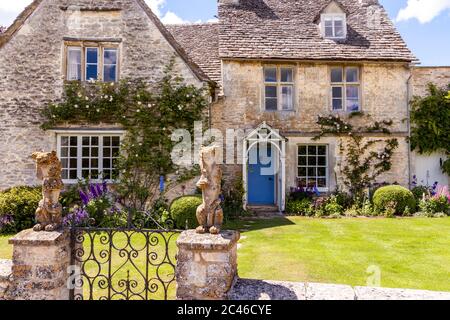 A typical old stone house in the Coln Valley in the Cotswold village of Winson, Gloucestershire UK