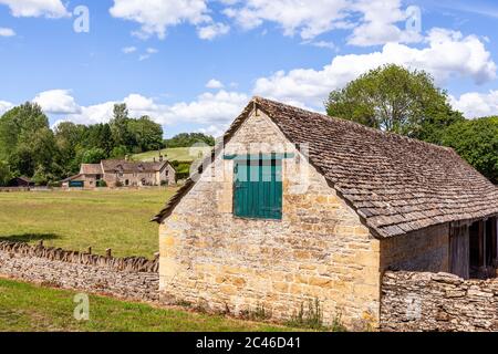 The Coln Valley - looking across to Yanworth Mill beside the River Coln near the Cotswold village of Yanworth, Gloucestershire UK Stock Photo