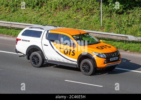 2019 QTS orange white Mitsubishi L200 Challenger DI-D Auto; Vehicular traffic, LCV transport, modern vehicles, saloon cars, vehicle on UK roads, motors, motoring on the M6 motorway Stock Photo