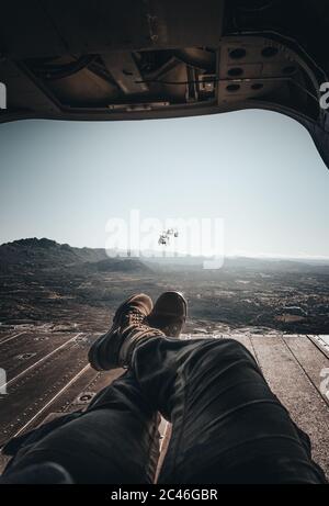 An amazing shot of an airborne forces soldier lying in the airplane Stock Photo