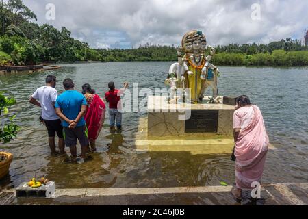 Grand Bassin Lake, Mauritius, January 2020 - People of Hindu faith pray and make offerings at the holy lake also known as Ganga Talao Stock Photo