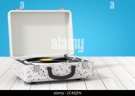 Portable Vintage Style Music Player Turntable in White Case on a wooden table. 3d Rendering Stock Photo