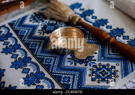 Christian silver cup on the white towel Stock Photo