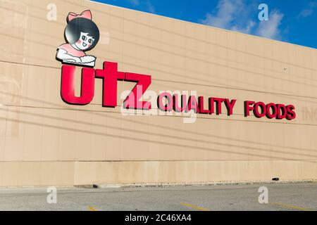 A logo sign outside of a facility occupied by Utz Quality Foods in Hanover, Pennsylvania on June 12, 2020. Stock Photo