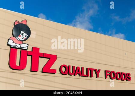 A logo sign outside of a facility occupied by Utz Quality Foods in Hanover, Pennsylvania on June 12, 2020. Stock Photo