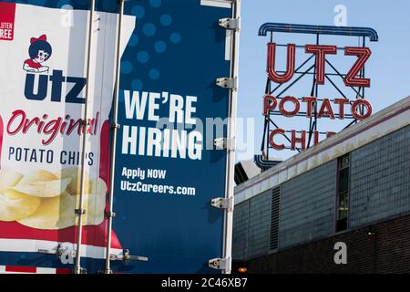 A logo sign outside of a facility occupied by Utz Quality Foods in Hanover, Pennsylvania on June 12, 2020. Stock Photo