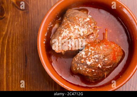tripe and rolls with sauce in bowls Stock Photo