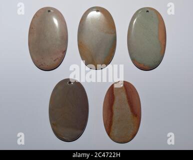 Natural multi color jasper on the white background Stock Photo