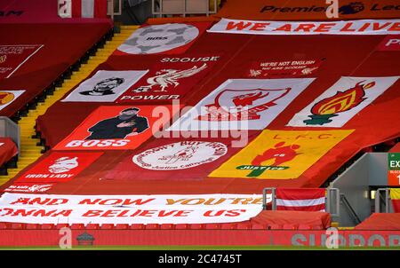 General view of flags and banners in the stands before the Premier League match at Anfield, Liverpool. Stock Photo