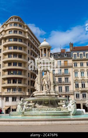 Fountain on Jacobin's square in Lyon, France in a beautiful summer day Stock Photo