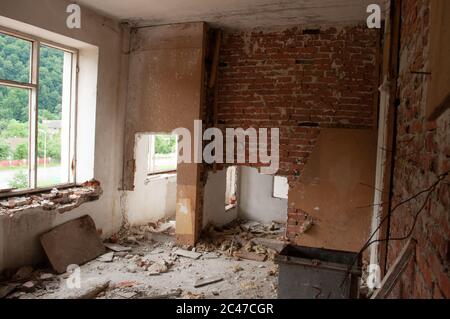 Ruined room in the abandoned office building Stock Photo