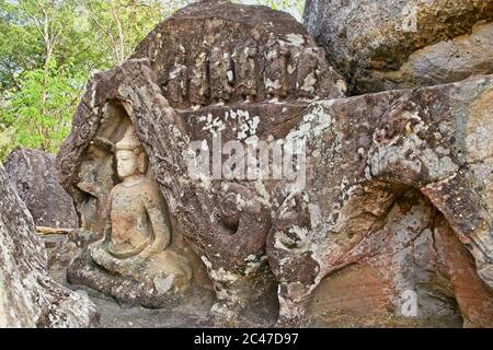 Phu Phra Bat Park Unusual rock formations formed by erosion Adapted as Buddhist shrines Weathered detail of buddha carvings in rock formations Stock Photo