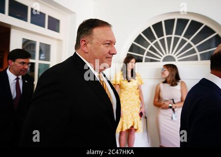 Washington, United States. 24th June, 2020. U.S. Secretary of State Mike Pompeo (RC) and US Secretary of Defense Mark Esper (L) arrive for President Donald J. Trump and Polish President Andrzej Duda's joint press conference in the Rose Garden of the White House in Washington, DC on Wednesday, June 24, 2020. Duda, a conservative nationalist facing a tight re-election back home, is the first foreign leader to visit the White House in more than three months. Photo by Jim Lo Scalzo/UPI Credit: UPI/Alamy Live News Stock Photo