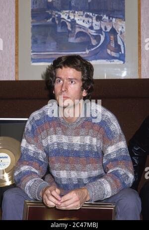 Genesis receiving gold discs backstage at the NEC Birmingham 26th February 1984: Tony Banks Stock Photo
