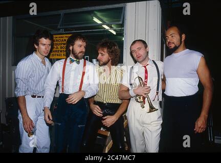 Genesis in concert on their Mama Tour at the NEC Birmingham 26th February 1984: left Tony Banks, Daryl Stuermer,Mike Rutherford,Phil Collins and Chest Stock Photo