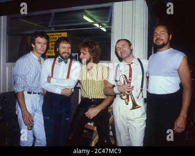 Genesis in concert on their Mama Tour at the NEC Birmingham 26th February 1984: left Tony Banks, Daryl Stuermer,Mike Rutherford,Phil Collins and Chest Stock Photo