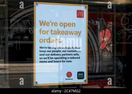 Eastleigh Hampshire, UK. June 24th 2020, Sign in McDonald's window announcing takaway orders and social distancing in the fast food restaurant, Eastleigh, Hampshire, UK Credit: Dawn Fletcher-Park/Alamy Live News Stock Photo