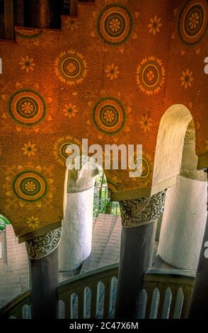 Decorative Spanish tile accents on walls and red brick steps leading up stairs at the historic Santa Barbara County Courthouse in Santa Barbara, CA Stock Photo