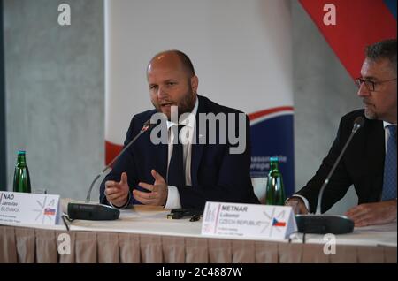 Prague, Czech Republic. 24th June, 2020. Slovak Defense Minister Jaroslav Nad (L) speaks during a press conference in Prague, the Czech Republic, on June 24, 2020. Defense ministers of Hungary, the Czech Republic, and Slovakia, and deputy defense minister of Poland, met here Wednesday to discuss mutual defense alliance before the handover of the group's presidency from the Czech Republic to Poland. Credit: Dana Kesnerova/Xinhua/Alamy Live News Stock Photo