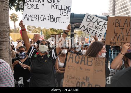LOS ANGELES - JUNE 2, 2020: Black Lives Matter George Floyd Protest on June 2, 2020 at Los Angeles City Hall and Grand Park in DTLA. young protesters. Stock Photo