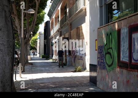 Santa Monica, CA/USA - June 9, 2020: A Santa Monica business on posh 4th Street attempting to operate after a long coronavirus quarantine and Black Li Stock Photo