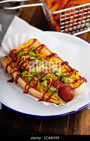 Grilled bacon wrapped hot dog Stock Photo