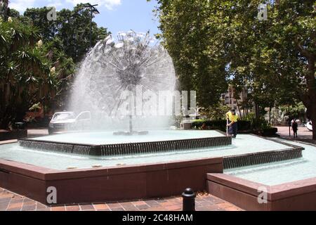 The Kings Cross Fountain is a well known landmark along Darlinghurst Road, Kings Cross. Stock Photo