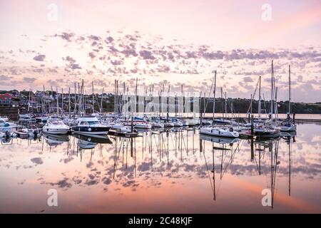 Kinsale, Cork, Ireland. 25th June, 2020. A calm and warm morning at dawn over yachts and leisure craft at the marina of the yacht club in Kinsale, Co. Cork, Ireland. - Credit; David Creedon / Alamy Live News Stock Photo