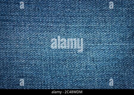 close view of a blue denim stone washed jean texture Stock Photo