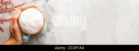 Autumn flat lay with mug of latte coffee on marble Stock Photo