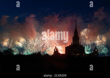 Moscow, Russia. 24th June, 2020. Fireworks explode above the Moscow State University building during celebrations marking the 75th anniversary of the Soviet victory against the Nazis in World War II in Moscow, Russia, on June 24, 2020. Credit: Alexander Zemlianichenko Jr/Xinhua/Alamy Live News Stock Photo