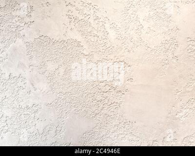 Beige low contrast smooth decorative plaster concrete textured background. Abstract soft neutral antique artistic backdrop texture to your concept or Stock Photo