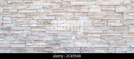 stone wall made of rocks with different size rectangles Stock Photo