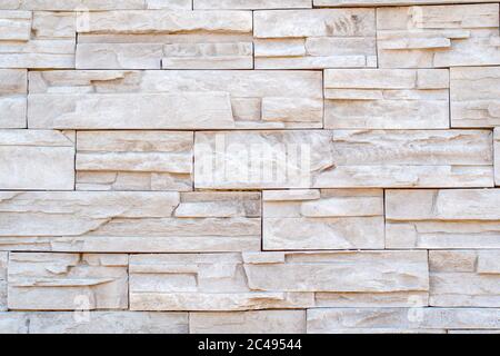 stone wall made of rocks with different size rectangles Stock Photo