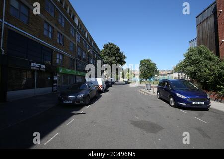 Overton Road in Angell Town, Brixton, south London, where riots and violent confrontations with police took place overnight. Fifteen officers were injured and four people were arrested following the incident. Stock Photo