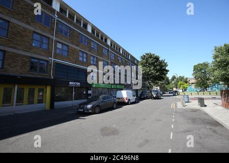 Overton Road in Angell Town, Brixton, south London, where riots and violent confrontations with police took place overnight. Fifteen officers were injured and four people were arrested following the incident. Stock Photo
