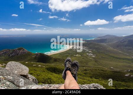 Hiker enjoying the view from the summit of Mount Oberon at Wilsons Promontory National Park at Victoria, Australia Stock Photo