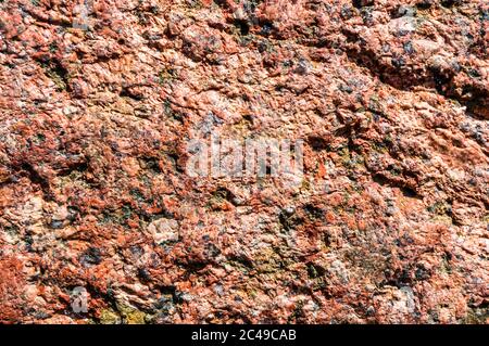 Closeup shot of red granite texture background Stock Photo