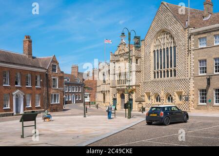 Kings Lynn, view of Saturday Market Place and the medieval Trinity Guildhall building sited in the historic centre of King's Lynn, Norfolk, UK Stock Photo