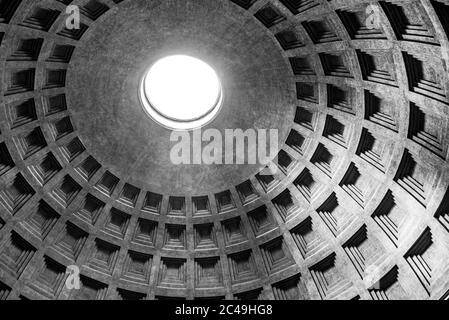 Monumental ceiling of Pantheon - church and former Roman temple, Rome, Italy. Black and white image.