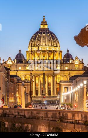 Vatican City by night. Illuminated dome of St Peters Basilica and St